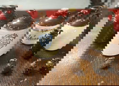 Group of 9 Miniature Stoneware Jugs