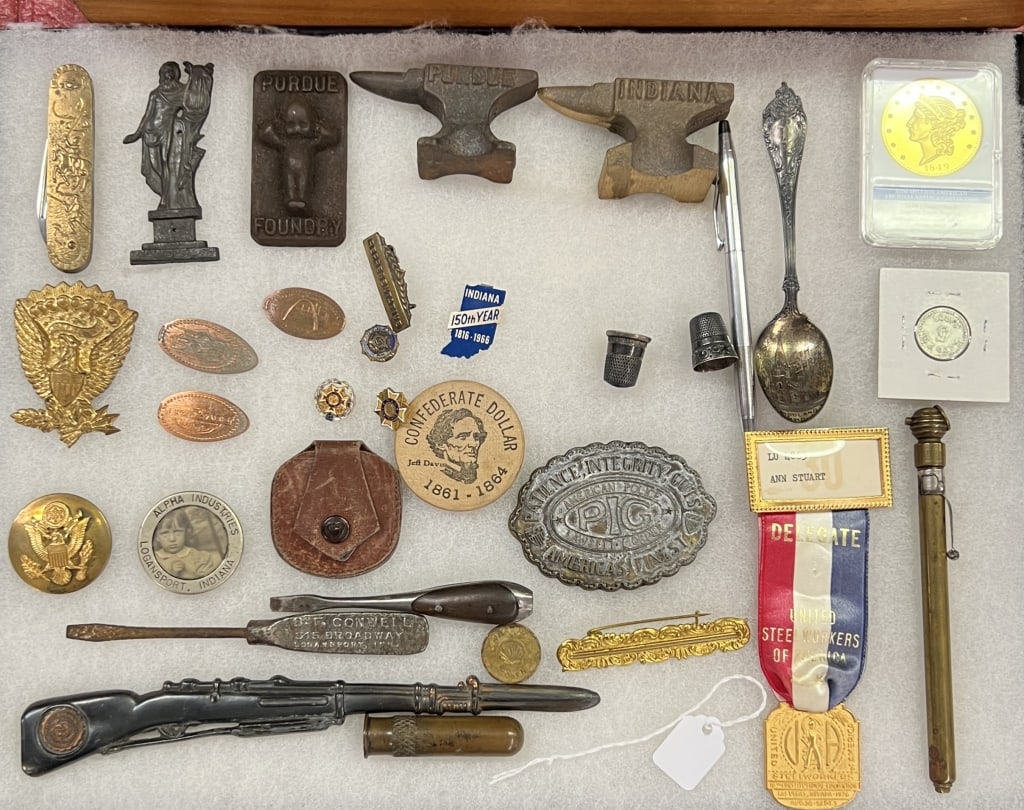 Group of Small Collectibles: Group of small collectibles: 2 military pin backs; brass handle pocket knife; Purdue Foundry paperweight; Purdue & Indiana anvils; 1849 Liberty Head double eagle replica; Durant & Star Automobile Deal