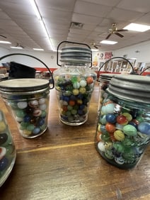 (7) Jars of Marbles