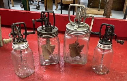 Group of Four Butter Churns