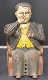 Cast Iron Mechanical Bank "The Politician"  has  original paint, working condition,  gentleman drops