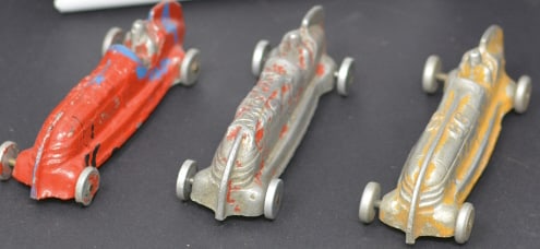 Three 1940's Cast Aluminum Race Cars: one  embossed  Speedway 46, one #66 marked  Playmate Peru,