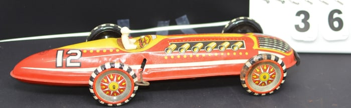 Marx Tin Wind Up Boat Tail Racer red, yellow,   black, & white graphics all original w/  original