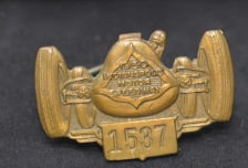 1950  Indy 500 Pit Pass Badge #1537 made by   Bastian Bros. Co., Rochester, NY. Badge is  car &
