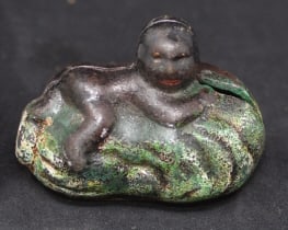 Cast Iron Black Americana Bank little boy  lounging  on watermelon retains original  paint.  3" x 2"