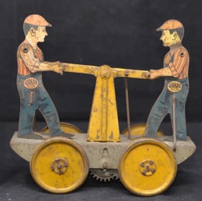 Girard Tin Toy Two man hand car wind up toy  original  litho, works. 6" x 6" x 3"