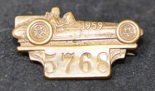 1959 Indy 500 Pit Pass Badge #5768 car & driver made by Bastian Bros., Rochester, NY: 1959 Indy 500 Pit Pass Badge #5768 car & driver made by Bastian Bros., Rochester, NY