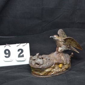 Cast Iron Mechanical Bank of Eagle & Eaglets   marked on base Patent date January 23, 1883   retains