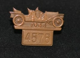 1966 Indy 500 Pit Badge #4575 signed Standard Dayton, made by Bastain Bros., Rochester, NY. of: 1966 Indy 500 Pit Badge #4575 signed Standard Dayton, made by Bastain Bros., Rochester, NY. of touring sedan.