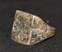 Vintage Indy 500 Sterling Ring has 500 over   crossed checkered flags,  flanking sides has  tire  &