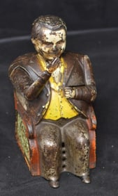 Cast Iron Seated Fat Man Tammany Bank   original  paint, missing stopper in bottom,  dated December