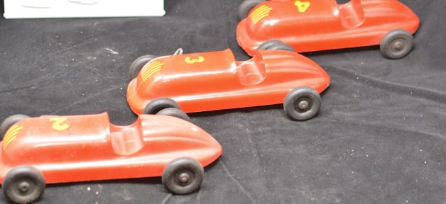 3 Saunders Tool & Die Co, Aurora, Illinois Toy Cars red. #'s 2, 3, 4 of the wind up race cars w/: 3 Saunders Tool & Die Co, Aurora, Illinois Toy Cars red. #'s 2, 3, 4 of the wind up race cars w/ rubber tires. 3" x 7" x 4"