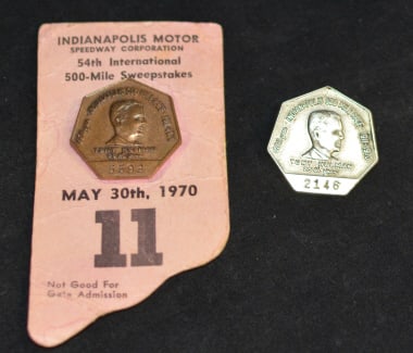 1970 Indianapolis 500 Pit Pass Badge #5593 of Tony Hulman w/ pink Indiana shaped backing made by: 1970 Indianapolis 500 Pit Pass Badge #5593 of Tony Hulman w/ pink Indiana shaped backing made by Bastain Bros., Rochester NY and #2146 w/o backing.