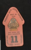 1974 Indy 500 Pit Pass Badge on Red Directional Arrow Backing #S375 of the track, made by: 1974 Indy 500 Pit Pass Badge on Red Directional Arrow Backing #S375 of the track, made by Bastain Bros., Rochester, NY
