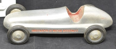 1940's Indy Speedway Souvenir Car Cast  Aluminum on  rubber tires red lettering & the  name Larry