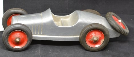 Toledo Racer Cast Aluminum Car 1940's Boat  Tail  red rims & tires w/ mounted spare tire.  Tires