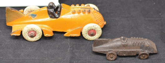 Two Hubley Cast Iron Boat Tail Racers: orange  cast  iron w/driver marked 10187 minor paint  loss