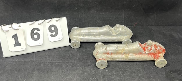Two Cast Aluminum Playmate Toys Boat Tail  Racers:  Made in Peru, Indiana by Playmate  Toys cast