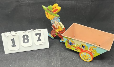 Chein Tin Litho Easter Toy of rabbit pulling  a  cart. Great condition, nice vibrant color