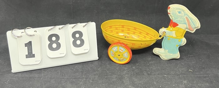 Chein Tin Litho Easter Toy of rabbit pushing  cart  shape of egg. Fine condition, great  colorful