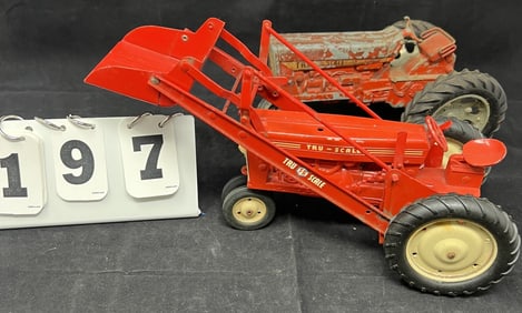 Two Vintage Tru-Scale Tractors: front end  loader  tractor good condition; one needs  restored.  6"