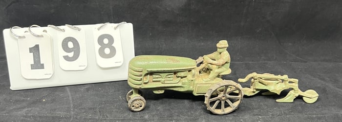 Cast Iron Farm Toy Tractor & Plow: Massey- Harris tractor w/ driver & two bottom plow tractor on