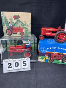 Two Farm Toy Tractors NIB: Farmall H  w/driver,  1991 National Farm Toy Show  Tractor. 8" x 12" x 7"