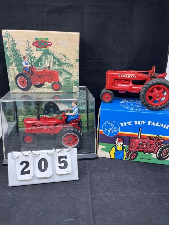 Two Farm Toy Tractors NIB: Farmall H  w/driver,  1991 National Farm Toy Show  Tractor. 8" x 12" x 7" (1 of 2)