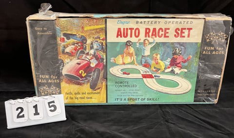 1960's Ungar Battery Operated Race Set  has  track  lay-out & in unopened original  packaging. 13" x