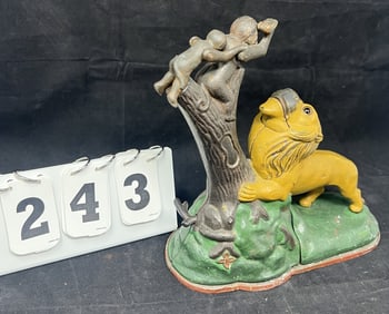 Cast Iron Mechanical Bank Lion & Monkeys  appears  to be original paint in working  condition  9" x