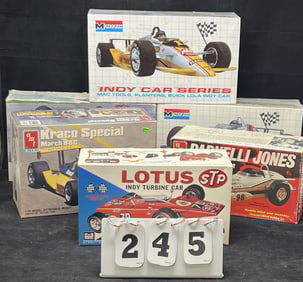 Six 1/24th Scale Model Race Cars: 3 Monogram Indy Car Series, a AMT Parnelli Jones, a  Kraco