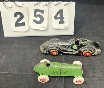 Two Cast Iron Race Cars: Arcade Stanley For  Life  Tru-Zero Hook Model black w/ red rims,  AC