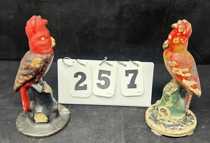 Two Cast Iron Parrot Door Stops by Albany  Foundry  circa 1920s.  One retains most of  original
