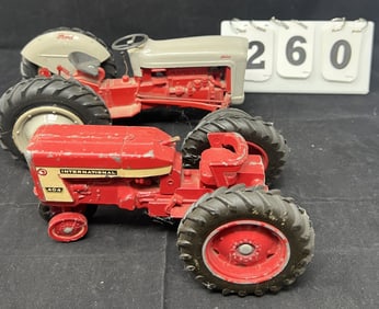 Two Farm Toy Tractors: Ford 8N 4" x 10" x 5"   & IH  cast aluminum 404 4" x 7" x 4"