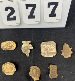 Group of 7 Pit Pass Badges including 1996  U0769  bronze, 1999  TT291 bronze, 1998 RR893  bronze,