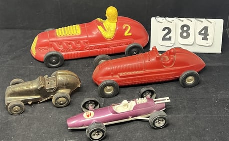 Four Race Cars including Erwin Corporation  made on  Fifth Ave NY red w/yellow driver #2  car,  all