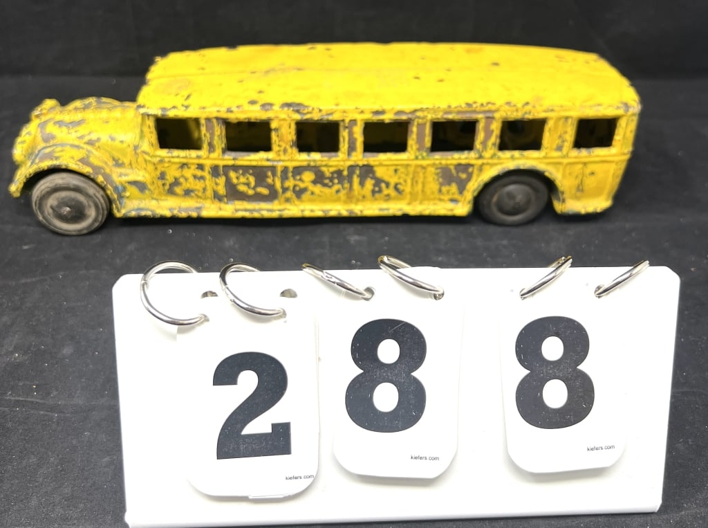 Arcade Yellow Bus older flaking paint green  under  yellow on rubber wheels. No driver.    3" x 12" (1 of 6)