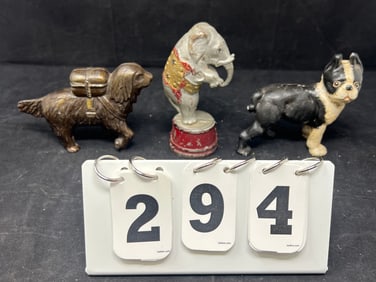 Three Cast Iron Animal Banks: Boston Terrier  black  & white 5"x 5" x 2" , Circus Elephant  5.5" x