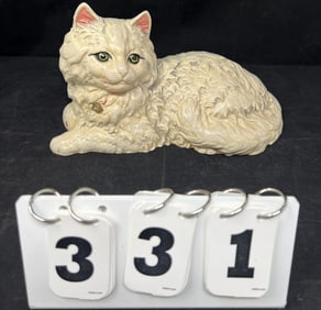 Hubley Cast Iron Lounging Cat  all original  paint  cat with pink inset ears & gold bell.   Marked