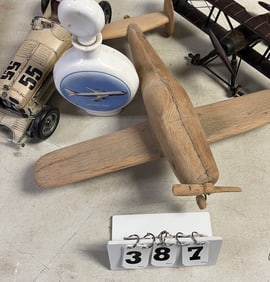 2 Wooden Airplanes, Boeing 747 Decanter &  steel  boat tail racer.  Largest item is 6" x  18" x 20"