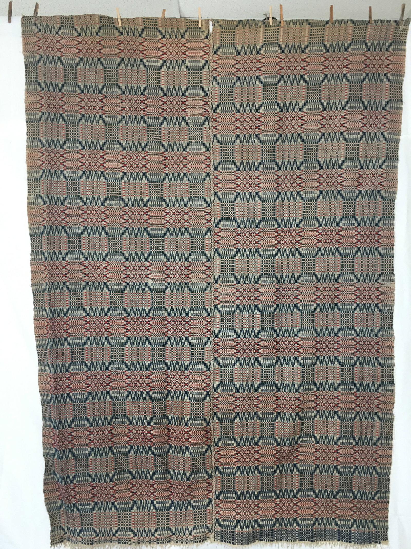Three Color Homespun Coverlet: Three Color Homespun Woven Coverlet in Red/Blue/Green. One fringed edge. Very light wear, condition consistent with age and use. 62"W x 87" L