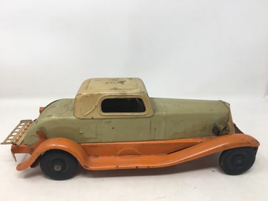 Girard Pressed Steel Deluxe Coupe Wind Up Car