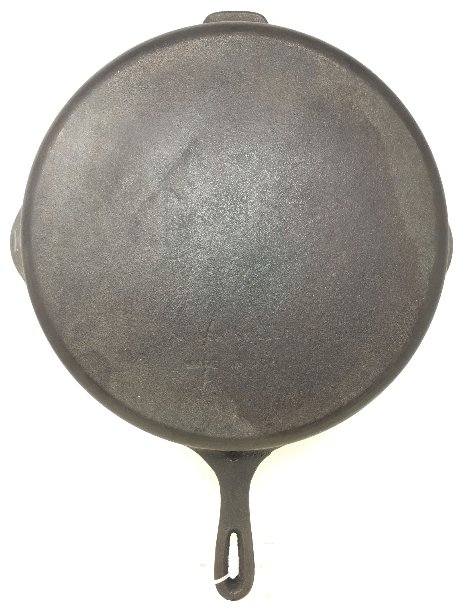 #12 Cast Iron Skillet: #12 CI Skillet. Marked "14 Inch Skillet Made in USA" on bottom. 19"L x 14.5"W x 2.5"H