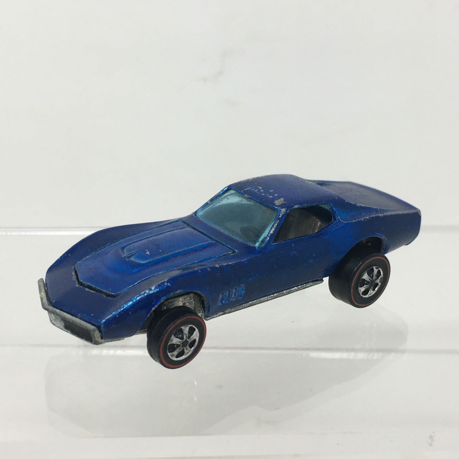 Mattel Hot Wheels Red Line Custom Corvette: Mattel Hot Wheels Red Line Die Cast Car. Marked "Custom Corvette 1967 Mattel, Inc. US and For. Pat. Pend. Hong Kong". Hood opens. Blue colored.