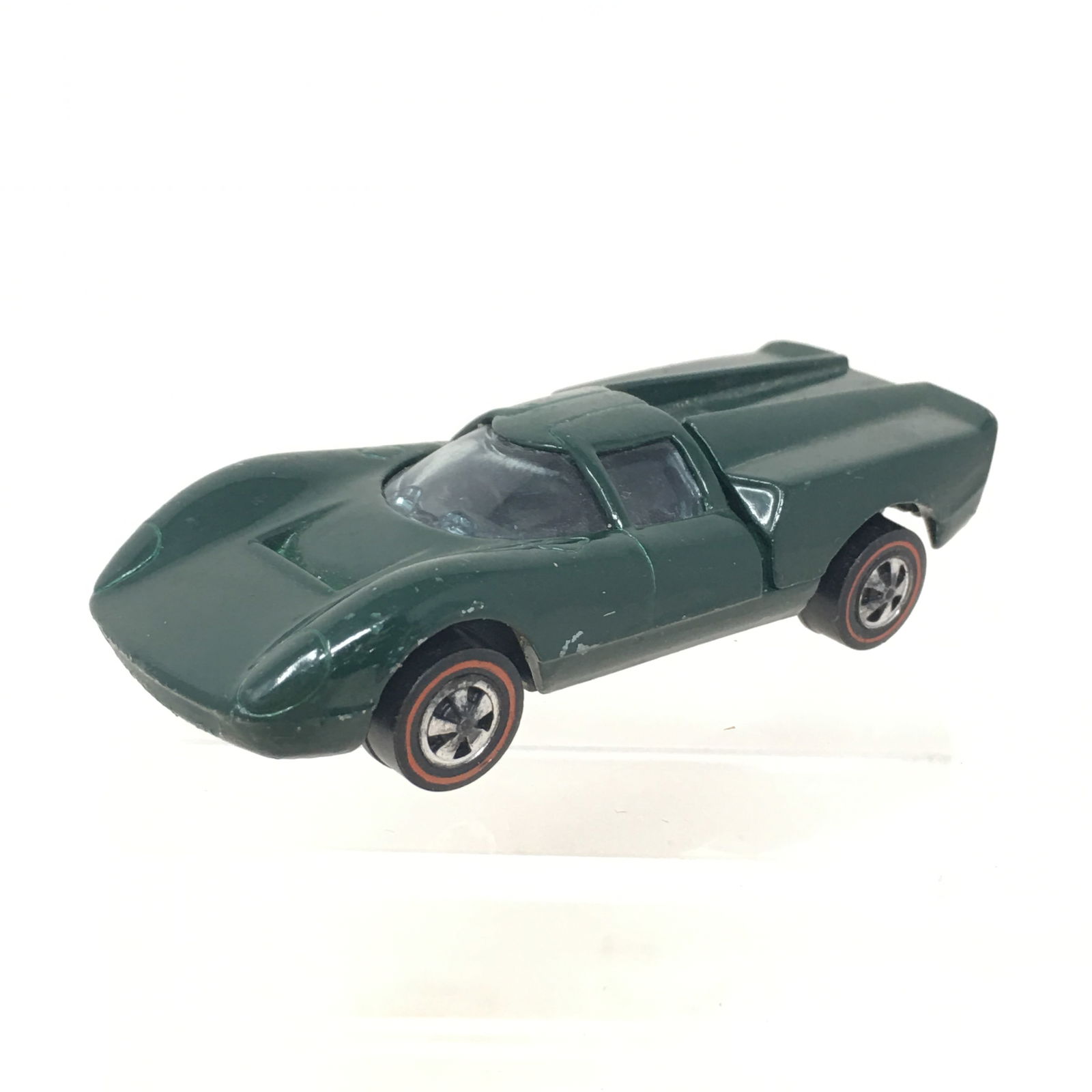 Mattel Hot Wheels Red Line Lola GT70: Mattel Hot Wheels Red Line Die Cast Car. Marked "Lola GT70 1968 Mattel, Inc, USA U.S. and Foreign Pat. Pend.", Green colored.