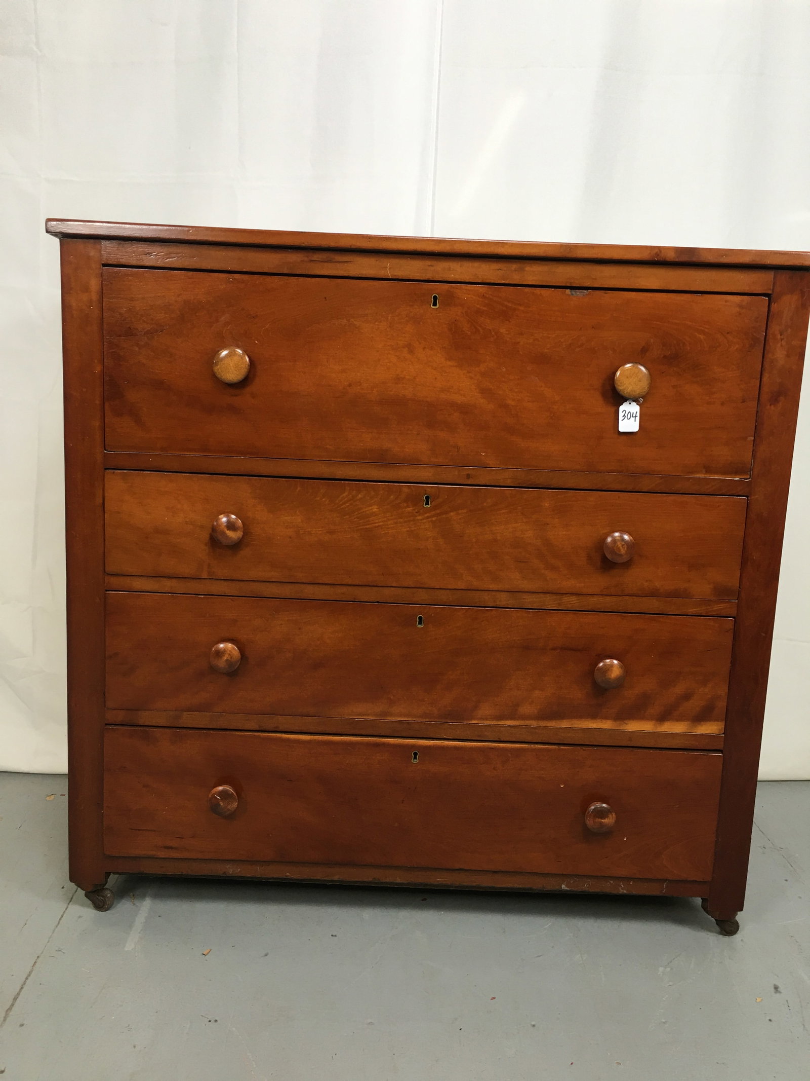 Cherry 4 Drawer Chest: 1850's Cherry 4 Drawer Chest. Large top drawer, wooden knobs, dovetailed drawers. 42"W x 20"D x 40"T
