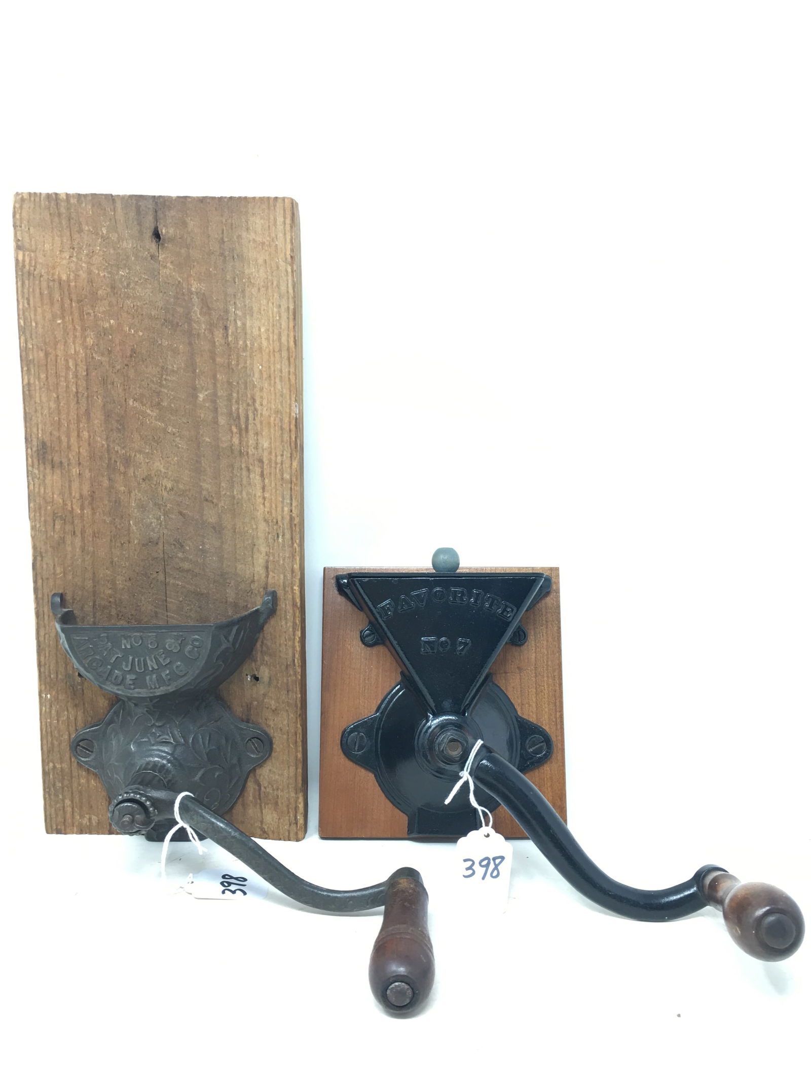 (2) Wall Mount Coffee Grinders: (2) Wall Mount Coffee Grinders. 1) Arcade No. 5, Arcade Mfg. Co., Pat June 94, 5.75"W x 13.75"H; 2) Favorite #7, 5.5"W x 6"H.