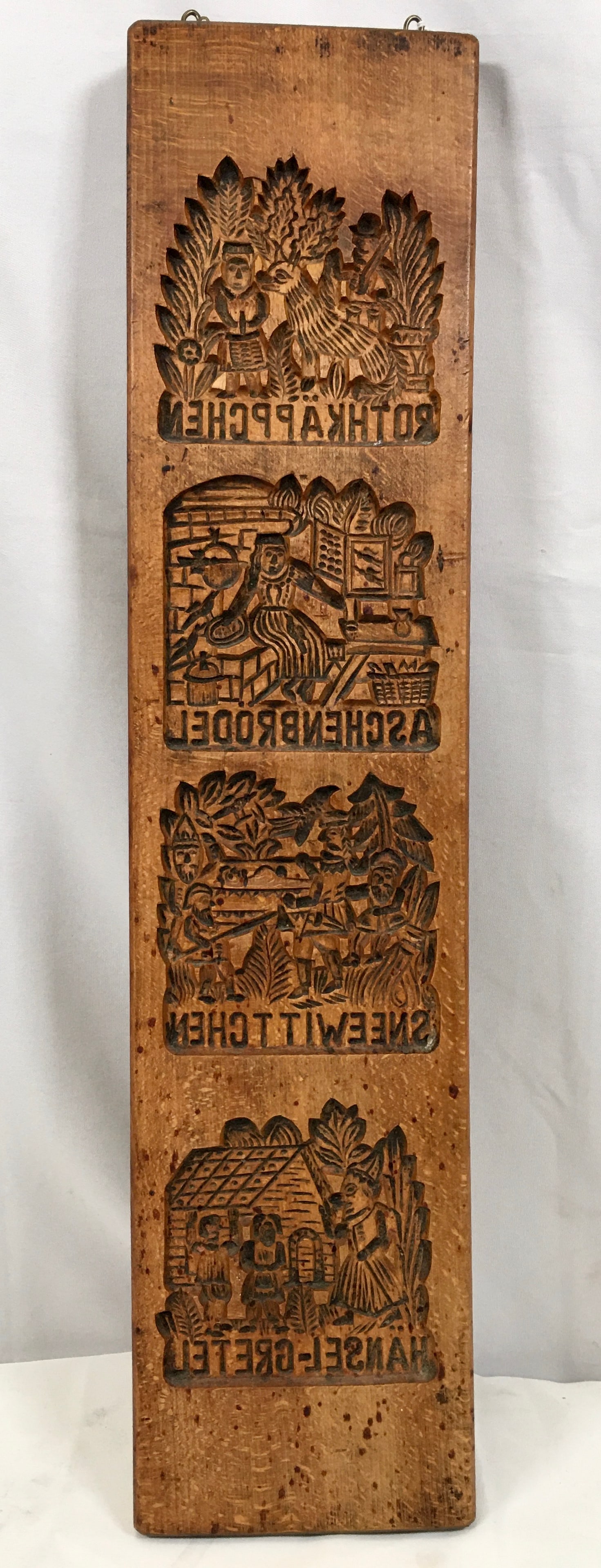 Fairy Tale Wooden Gingerbread Mold: Fairy Tale Wooden Gingerbread Mold. Features pictures of Red Riding Hood, Cinderella, Sleeping Beauty, and Hansel & Gretel. Names in German. 5.5"W x 24.25"H x 1"D