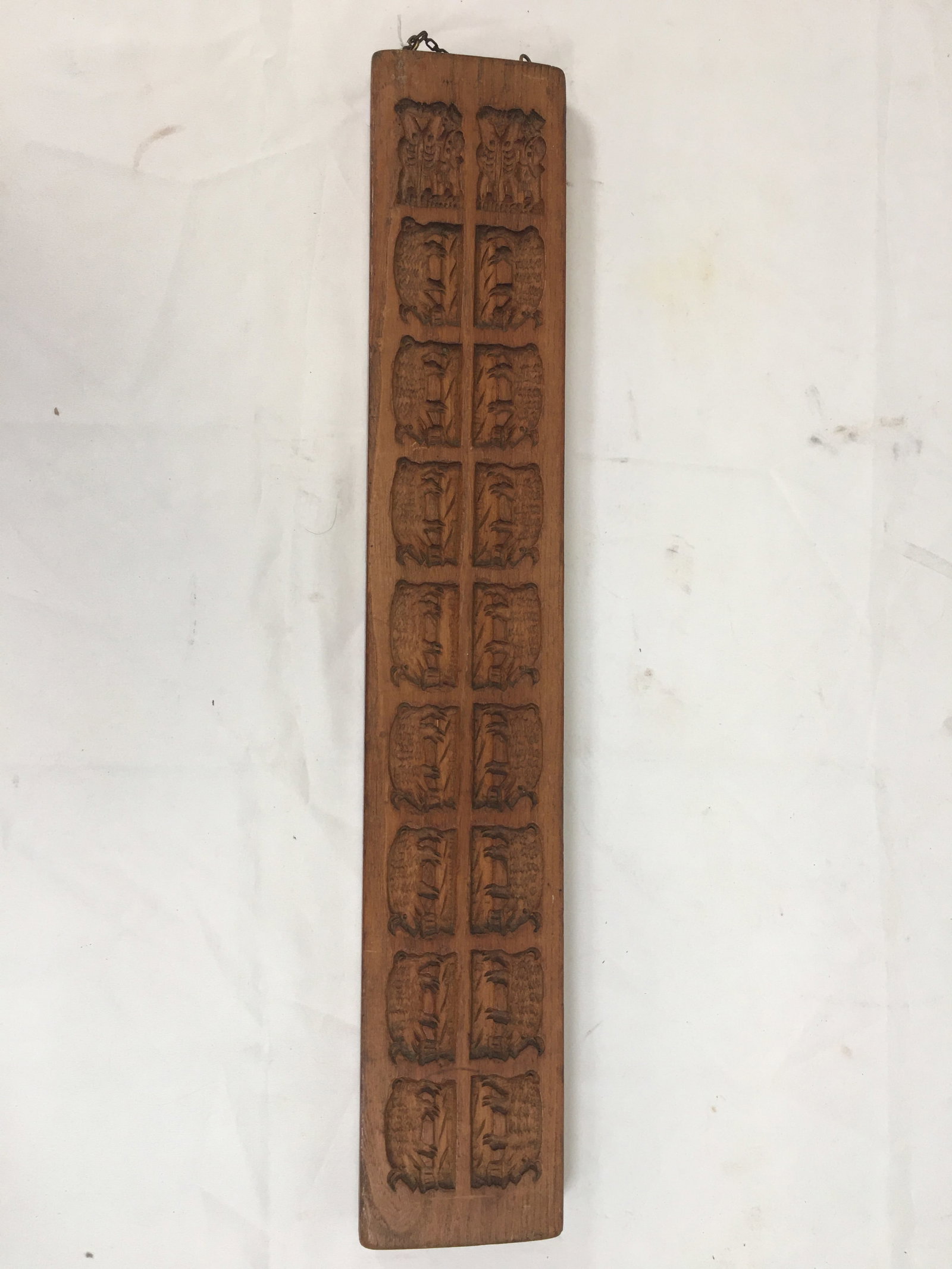 Double Sided Wooden Gingerbread Mold: Double Sided Wooden Gingerbread Mold. One side with farmer & pigs. Other side features people, a windmill, ship and various animals. 4.5"W x 26.75"H x 1.25"D
