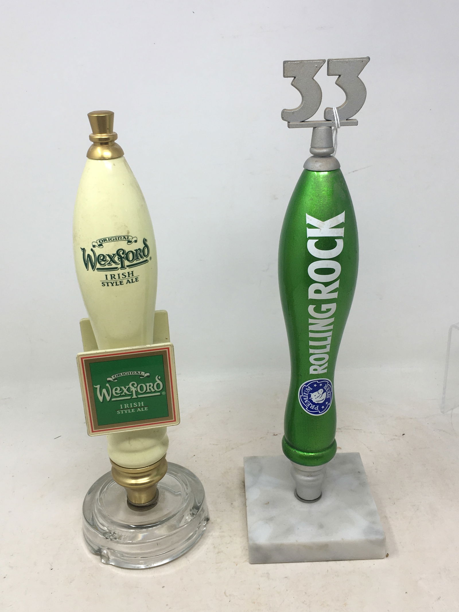 (2) Beer Tap Handles: (2) Beer Tap Handles, Wexford Irish Style Ale; Rolling Rock Premium Beer. Mounted on bases. Highest 14"